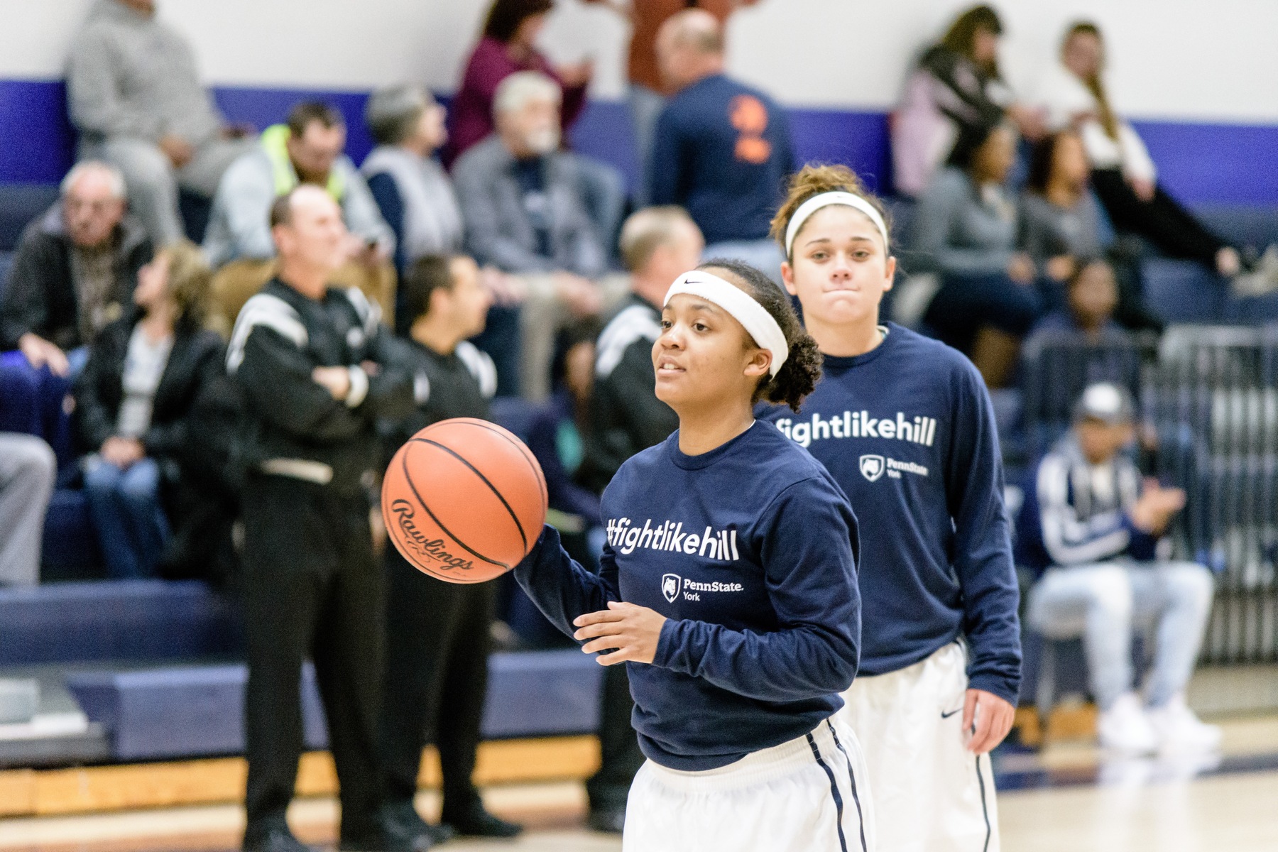 Charzima Johnson and Emily Colon warm up before the first annual Maddie Hill Basketball Games, last season.
