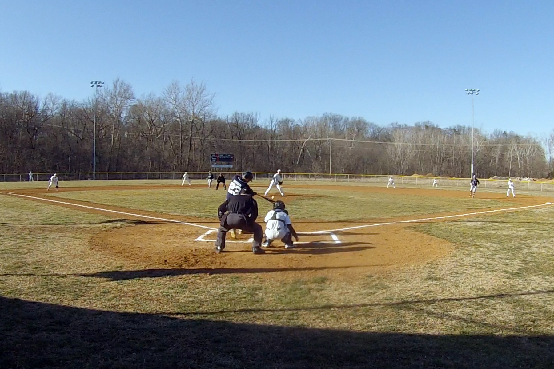 Brad Church connects for a first-inning three-run blast in the first game of the double-header at Christendom.