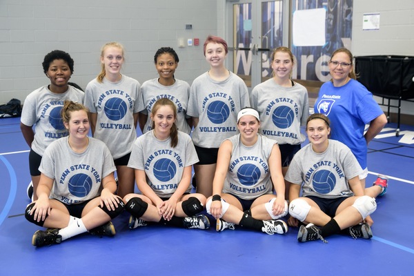 Coach Dana Vandergrift and the Penn State York Women?s Volleyball team after a recent practice.